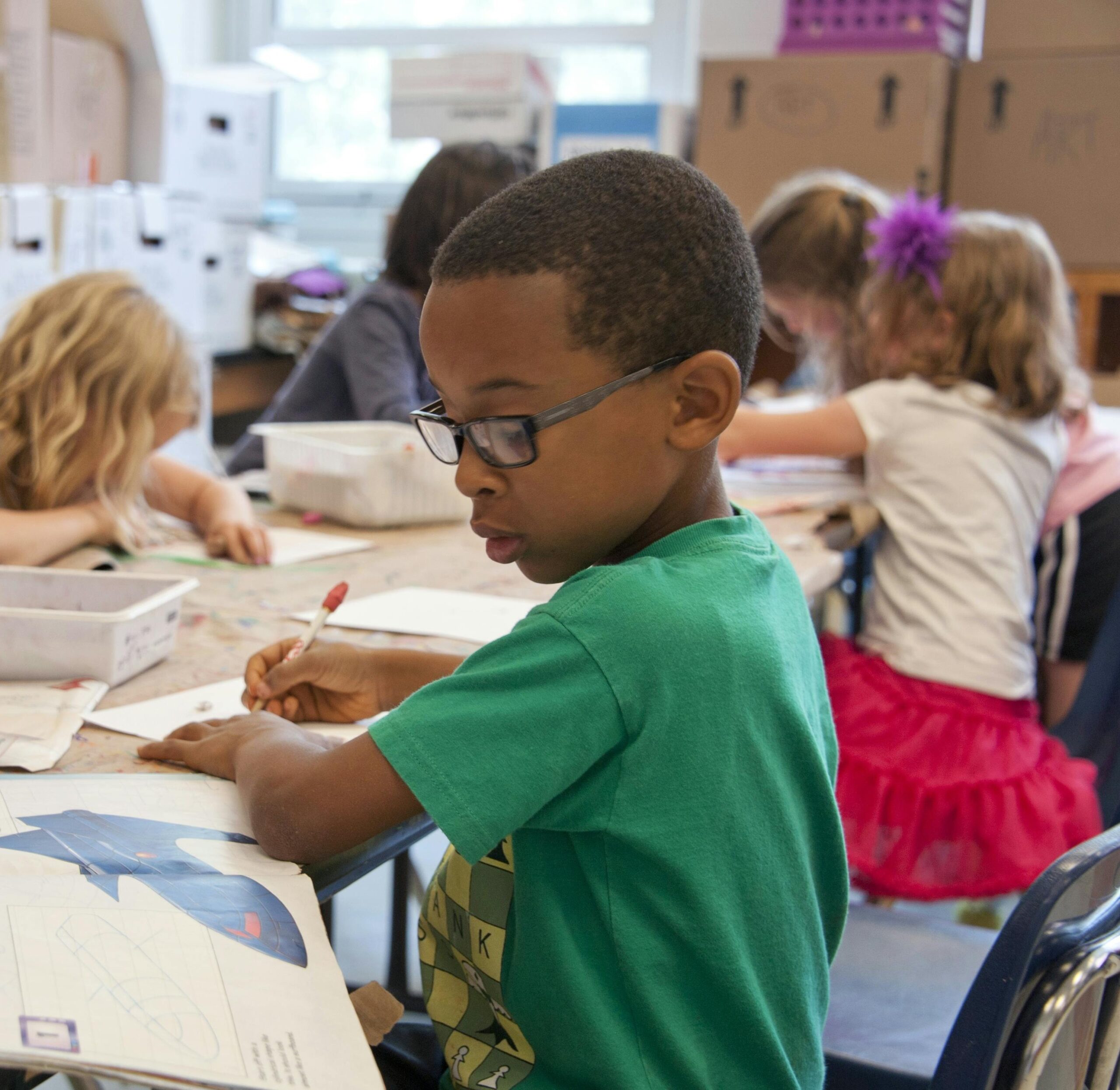 picture of youngster working on a project